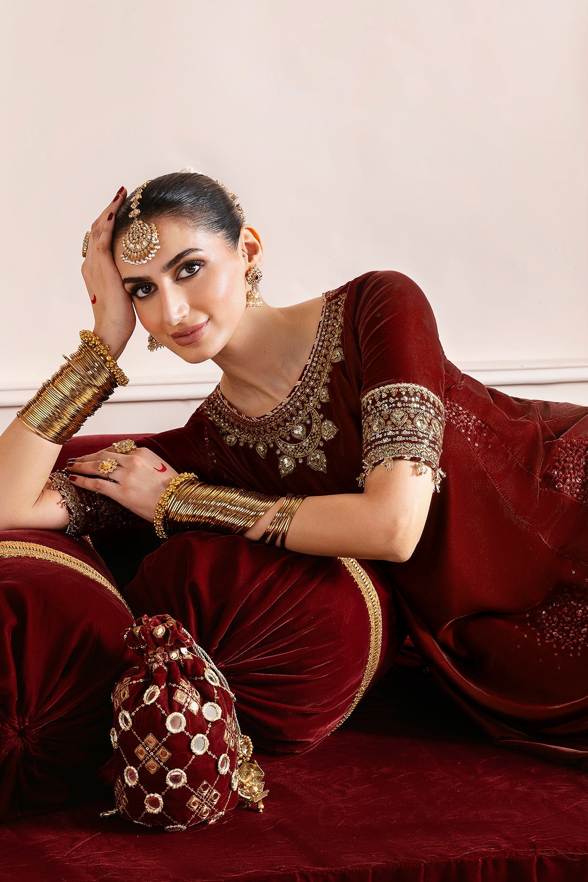 Women Wearing Embroidered Velvet Formal CVF D-13 Rust Long Shirt with Sharara for Wedding Events - Pakistani Designer Wear for Women in UK | Kifat