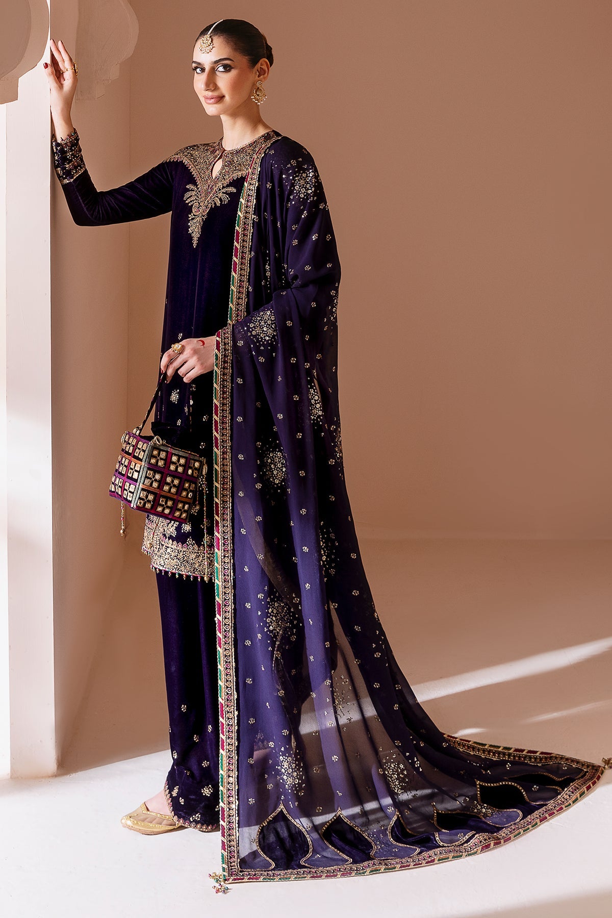 Women Wearing Embroidered Velvet Formal CVF D-08 Purple Shirt with Shalwar for Wedding Events - Pakistani Designer Wear for Women in UK | Kifat