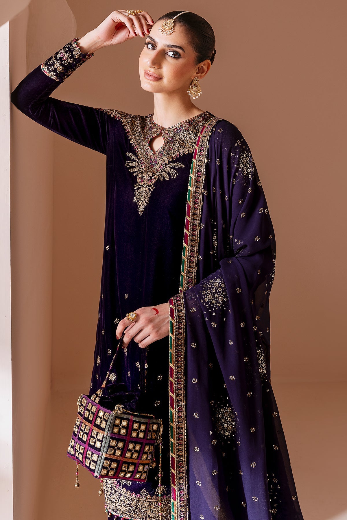 Women Wearing Embroidered Velvet Formal CVF D-08 Purple Shirt with Shalwar for Wedding Events - Pakistani Designer Wear for Women in UK | Kifat