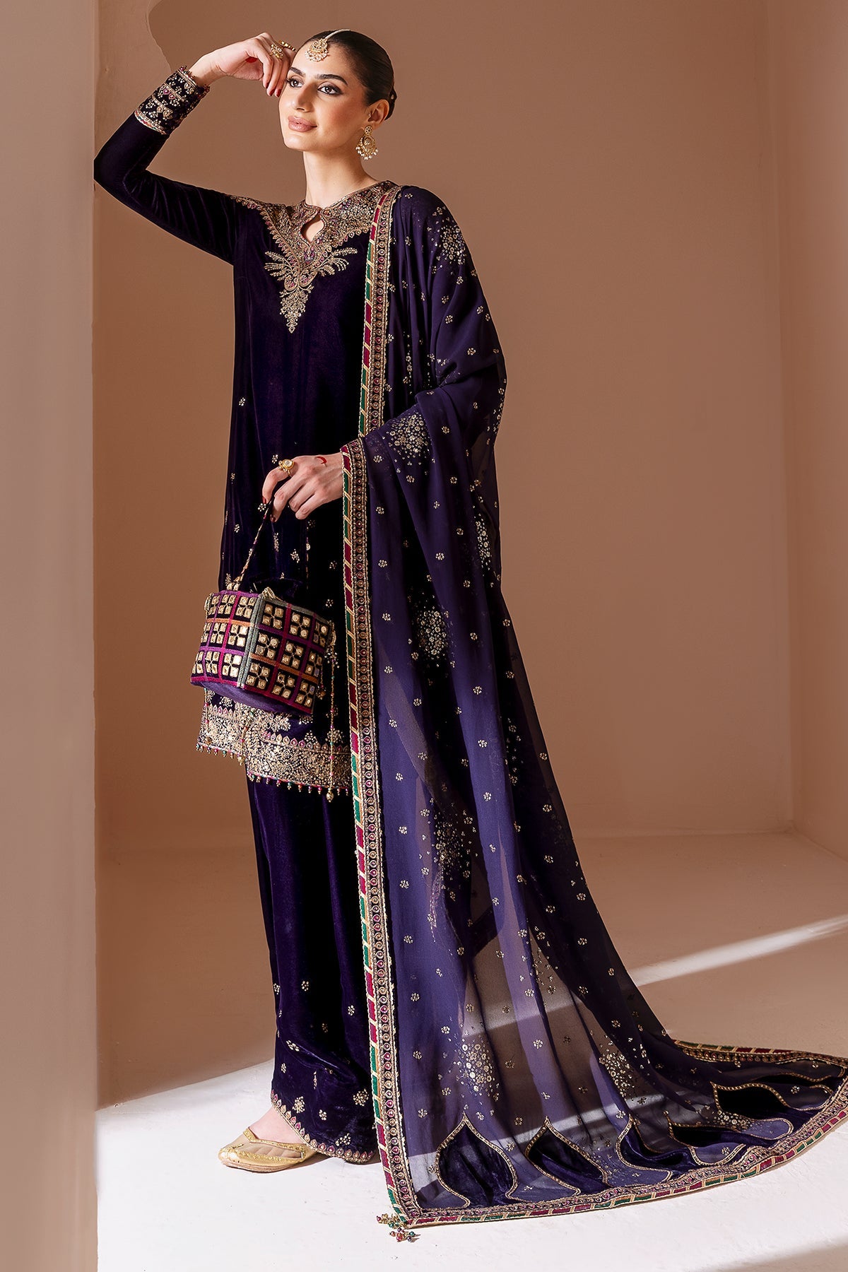Women Wearing Embroidered Velvet Formal CVF D-08 Purple Shirt with Shalwar for Wedding Events - Pakistani Designer Wear for Women in UK | Kifat