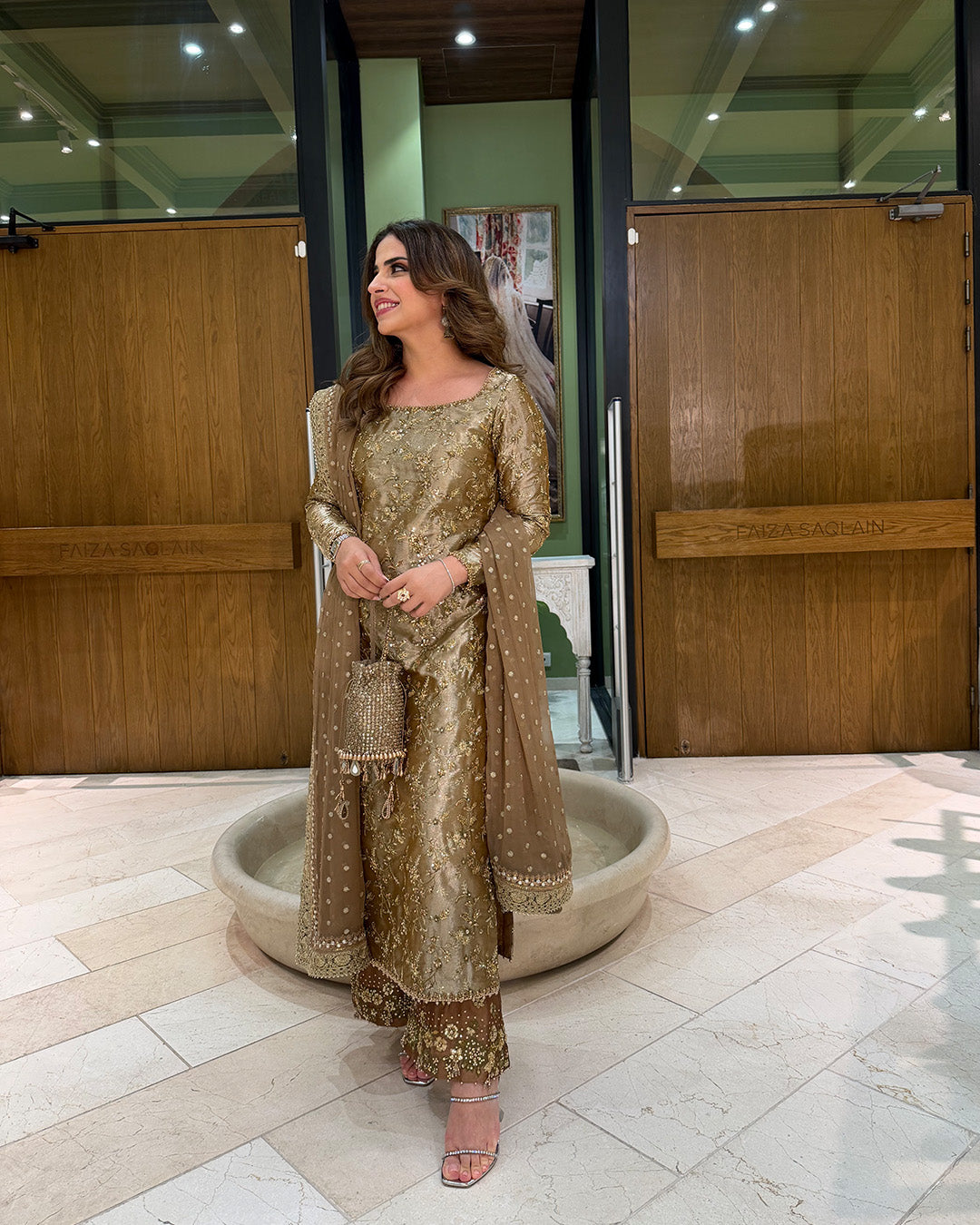 Model Wearing Faiza Saqlain Reit Mustard Gold Hue Shirt with Trouser for wedding wear - Pakistani Designer Wear for Women in UK | Kifat