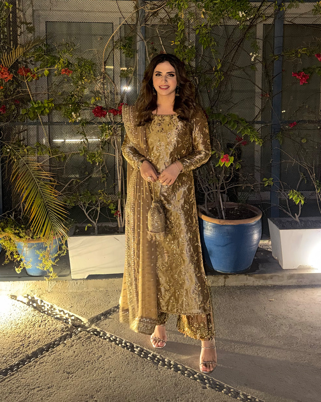 Model Wearing Faiza Saqlain Reit Mustard Gold Hue Shirt with Trouser for wedding wear - Pakistani Designer Wear for Women in UK | Kifat
