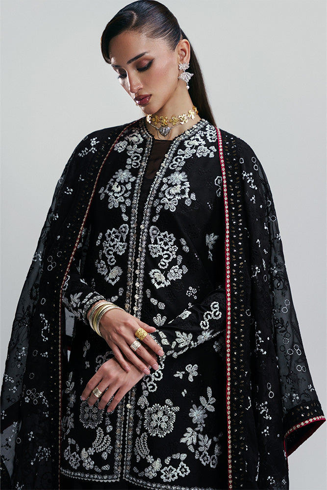 Model Wearing Suffuse by Sana Yasir ZAARISH Black short shirt with cigarette pants for Wedding Wear - Pakistani Designer wear for Women in UK | Kifat