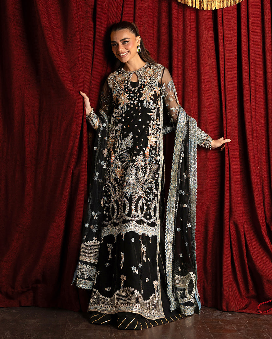 Women Wearing Malika Black Long Shirt with Sharara for Wedding Events - Pakistani Designer Wear for Women in UK | Kifat